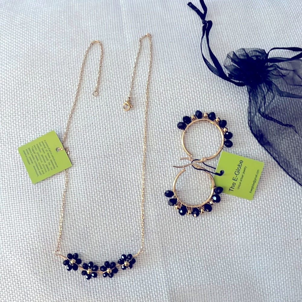 Beautiful black necklace and earring set. Made by The E-Globe artisan jewelry.